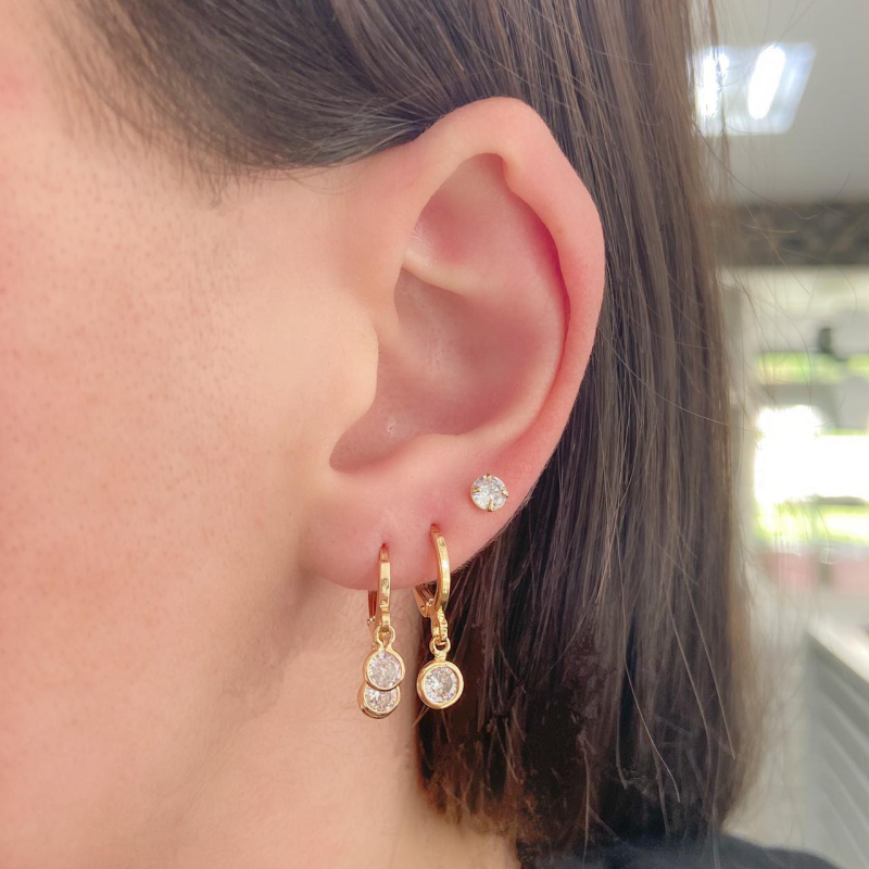 Argola Articulada Trio Zircônia Banhado a Ouro 18k.